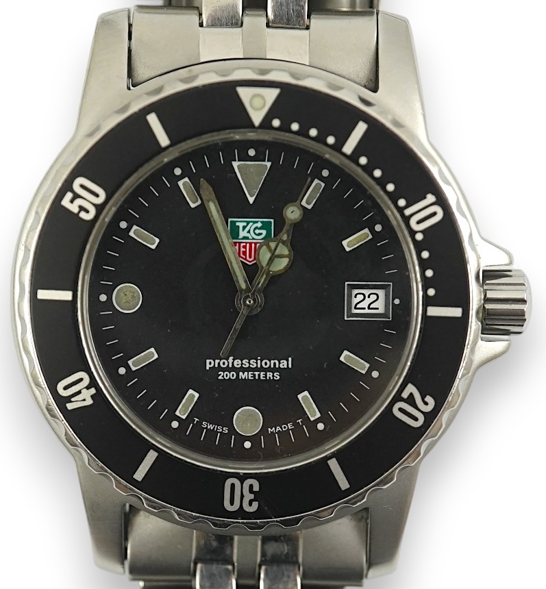 A gentleman's recent stainless steel Tag Heuer Professional quartz wrist watch, on a Tag Heuer stainless steel bracelet